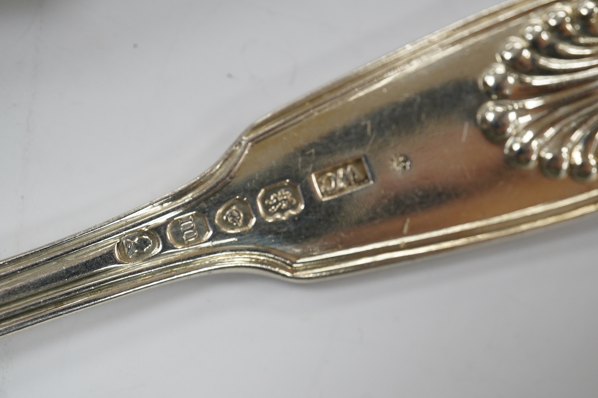 A set of six George IV silver fiddle, thread and shell pattern dessert forks and six matching spoons, William Chawner, London, 1827, 22.4oz. Condition - poor to fair
